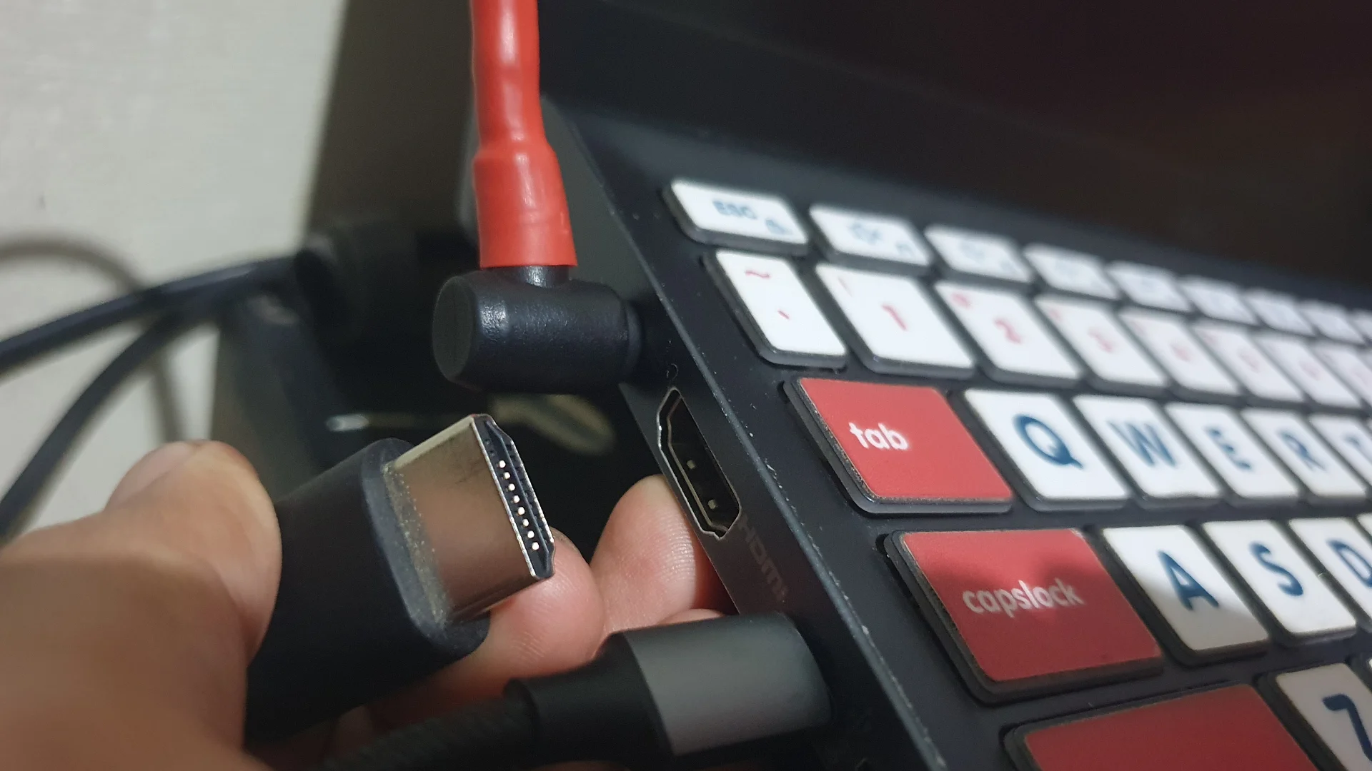 Plugging HDMI cable into laptop