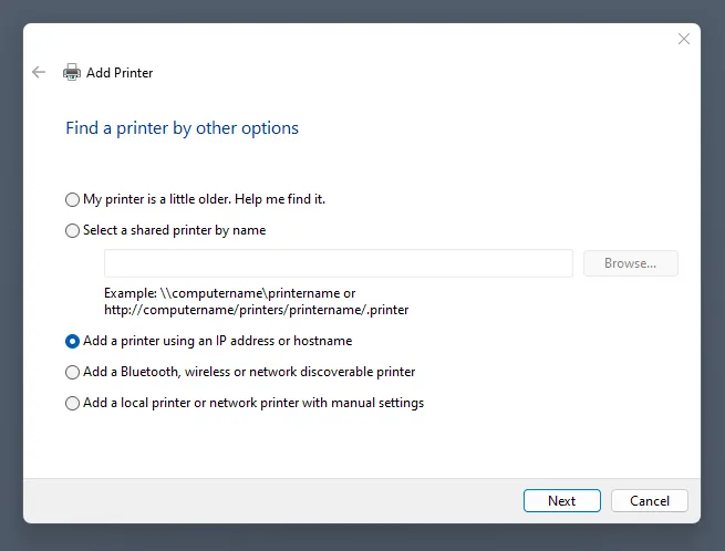 Windows Add Printer wizard selecting IP address option