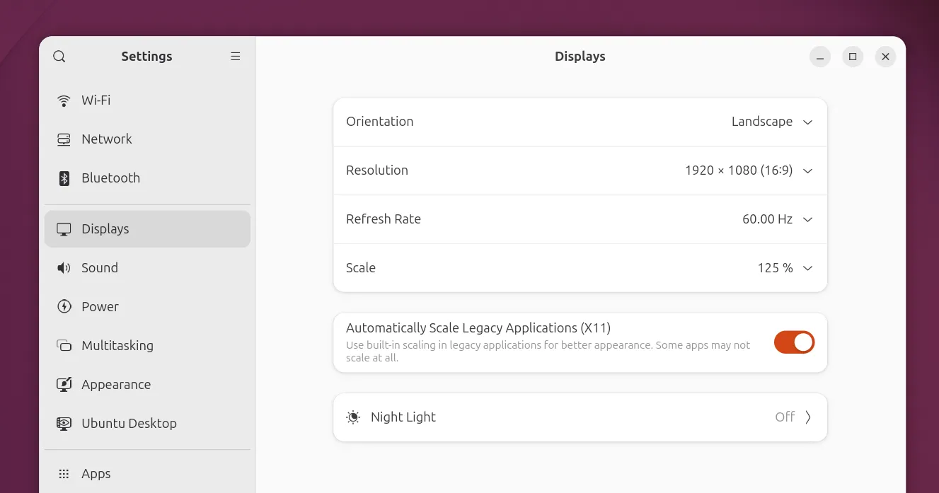Pengaturan Displays Ubuntu 26.04 dengan VRR aktif, fractional scaling, dan opsi scaling aplikasi X11 lawas.
